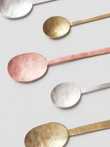 Small spoons, brass